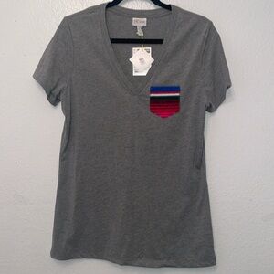 Fitted 2xl grey tshirt by K. Calor embellished with serape pocket.  Cotton